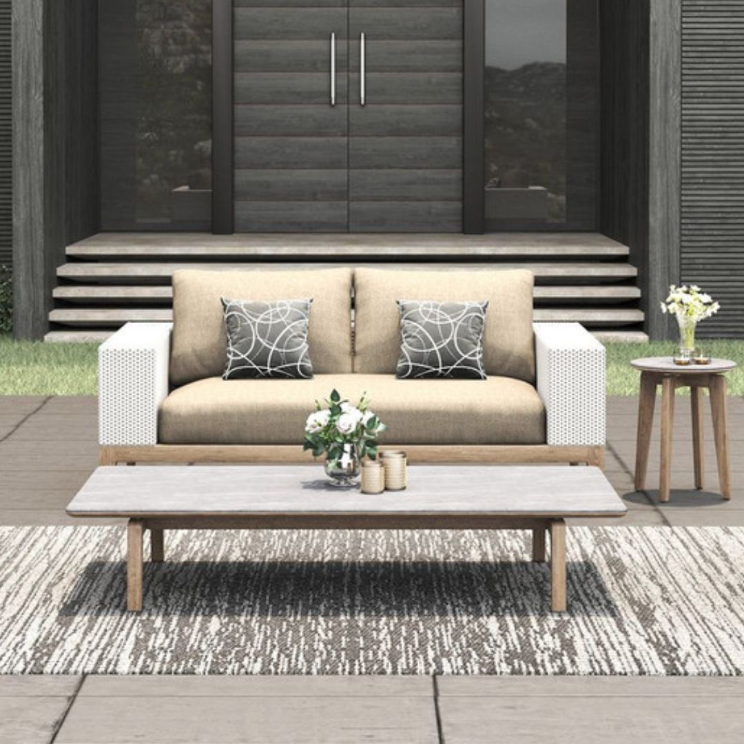 Teak wood sofa and cushions.